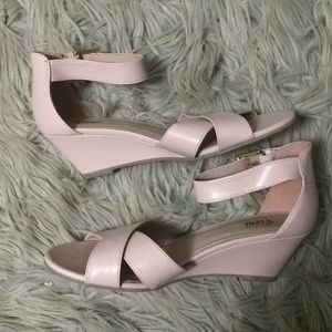 Blush pink wedge sandals.
